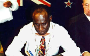 PNG Bougainville Premier Gerard Sinato signs the "Burnham Declaration" in 1997, which set in motion an end to the civil war.