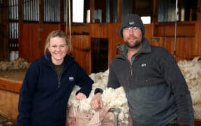 Julie and Murray wearing their West Ridge jerseys