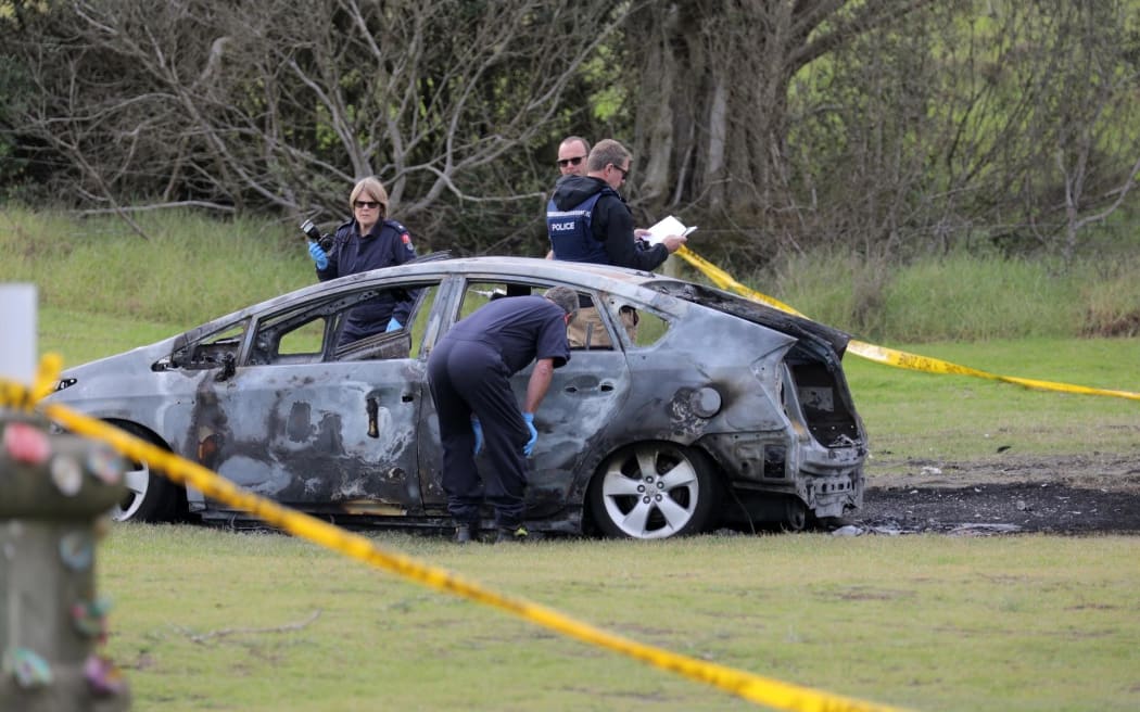 A body was found next to a burnt out car in Muriwai on the morning of 3 June 2025.