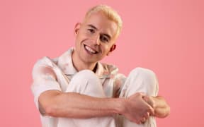 New Zealand comedian James Mustapic