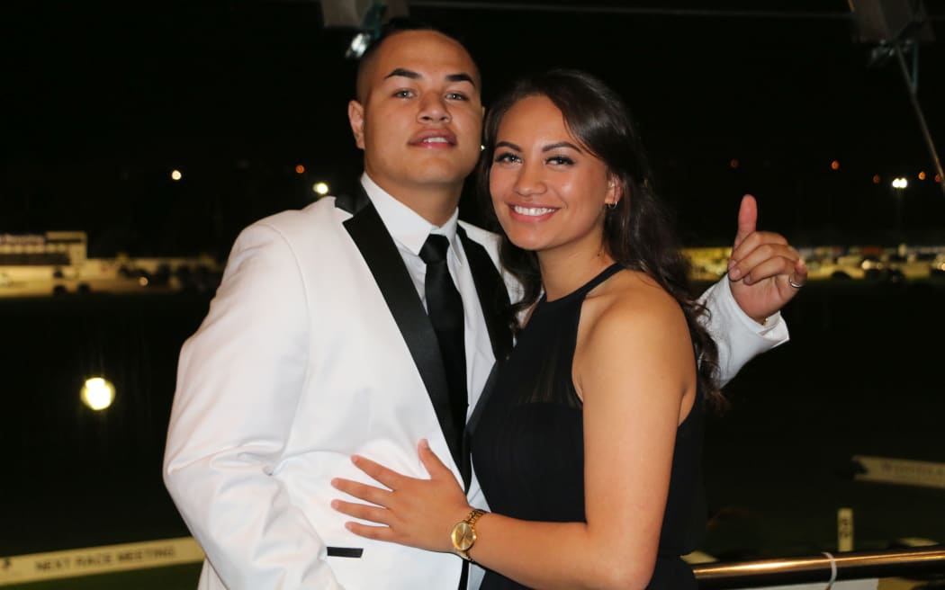 Sam Tipene-Rapana with her date, left, Lionel Wellington.