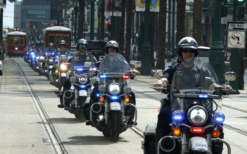 Police patrol outside the French Quarter ahead of Super Bowl LIX, where the Kansas City Chiefs will play the Philadelphia Eagles, in New Orleans, Louisiana, on February 7, 2025. (Photo by TIMOTHY A. CLARY / AFP)