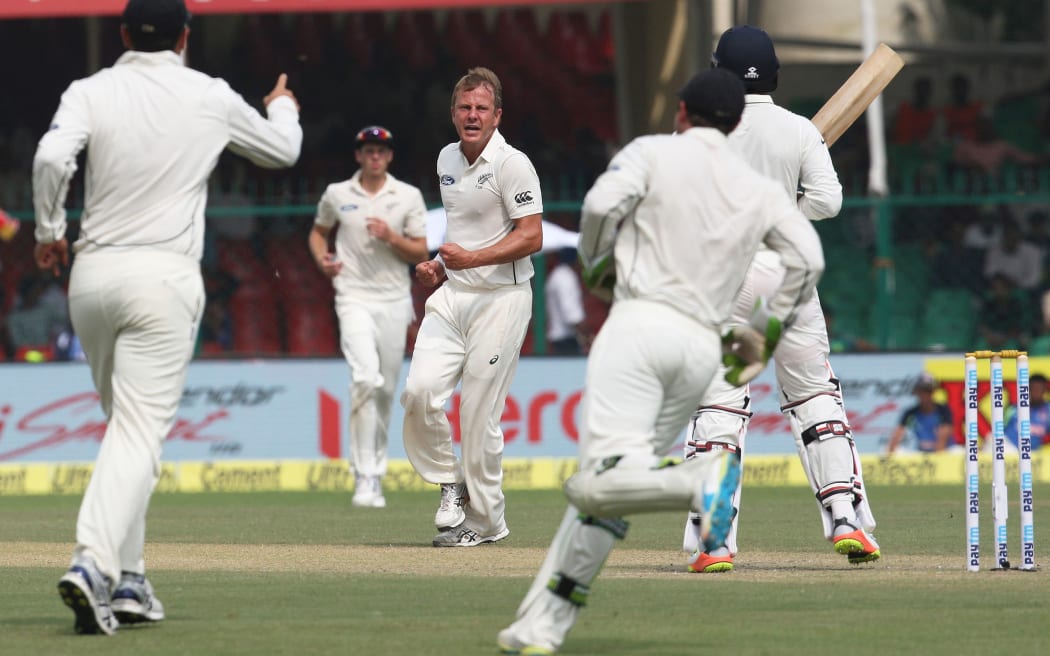 The Black Caps celebrate the final Indian wicket to fall.
