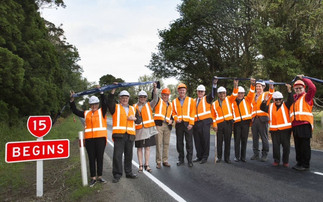 NZTA staff, council officials and local kaumātua mark the opening of the new state highway.