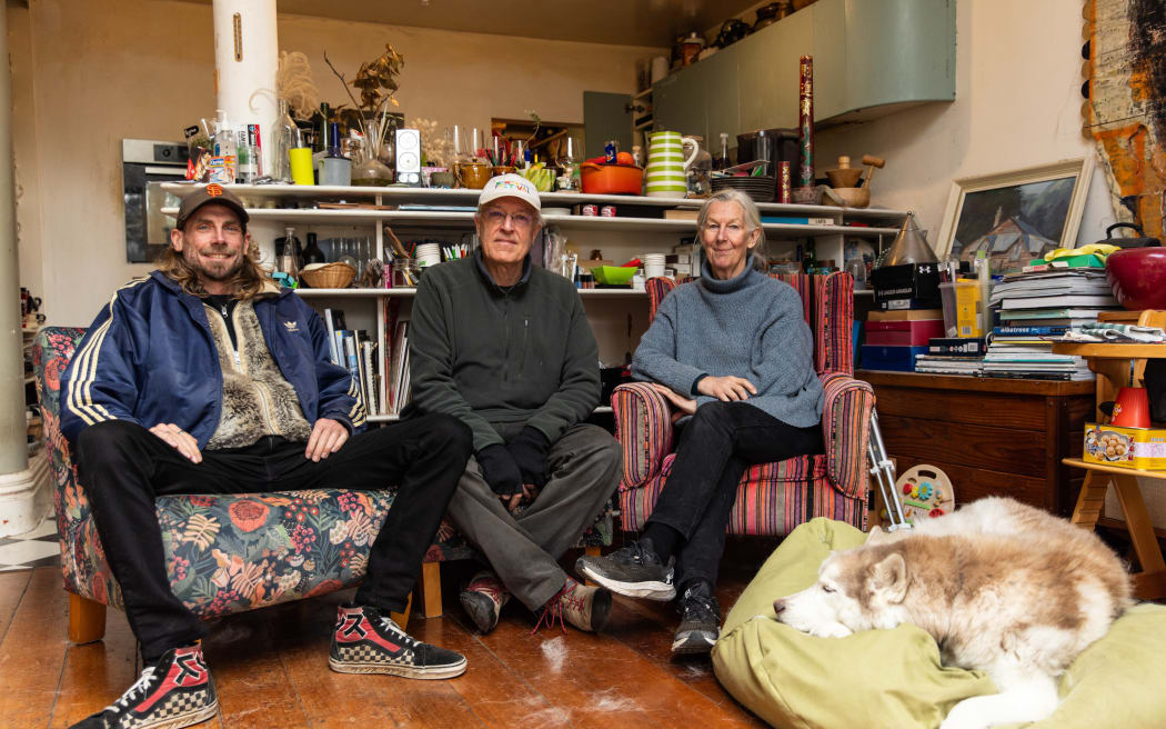 From left, Matt Rutledge, Martin Hanley and Anna Kemble Welch with Whiskey the dog