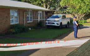 Armed police on Gibbs Road in Manurewa after a shooting.