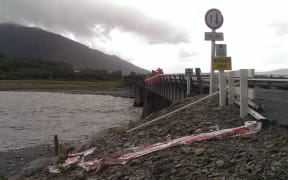 The car crashed through the safety barrier of this bridge just north of Harihari on the West Coast.