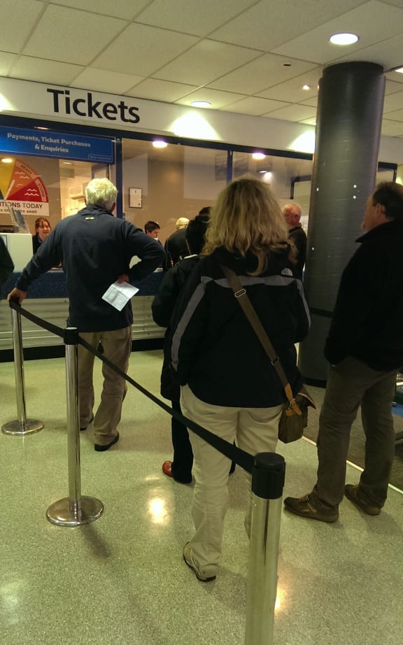 Passengers wait to rebook travel across Cook Strait.