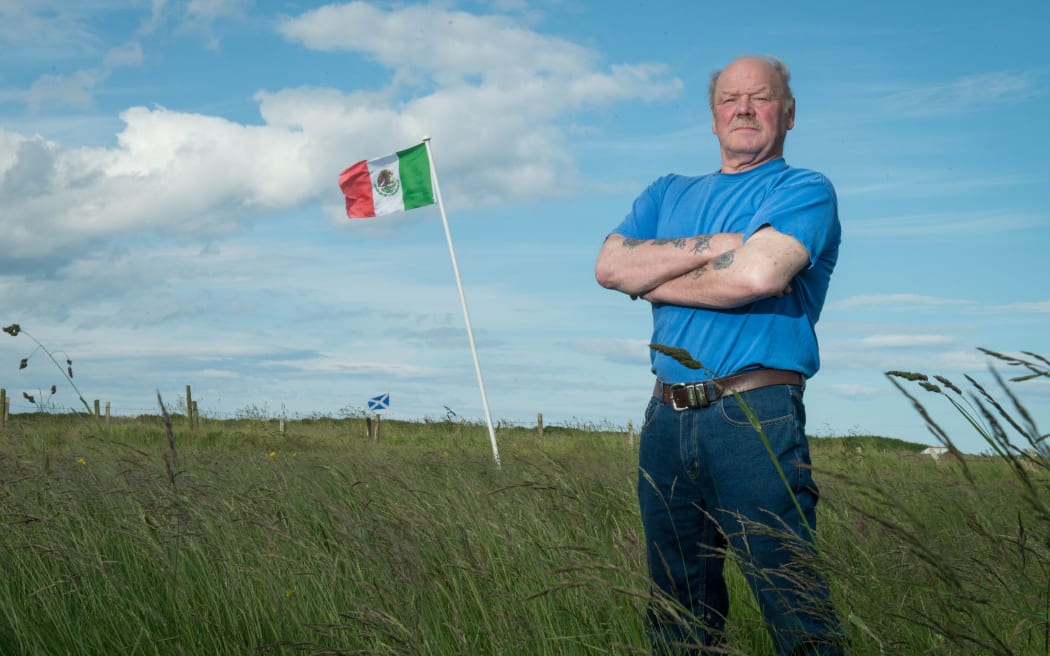 Scotsman Michael Forbes proudly flies the Mexican flag at his home north of  Aberdeen next to Trump International Golf Links course.