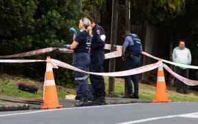 Police at the scene of a homicide investigation May Road Mt Roskill. A woman was found with critical injuries at the property on Friday morning and died shortly afterwards.