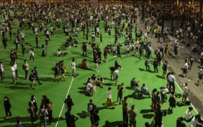 People respecting the social distancing rules during the Tiananmen Square vigil remembrance in Causeway Bay, Hong Kong.