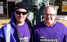 Kelvin Davis (left) with fellow marcher Eric Bolt as the hikoi reaches Orewa.