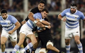 Argentina's Los Pumas fullback Emiliano Boffelli (2nd L) vies for the ball with New Zealand's All Blacks Ardie Savea (2nd R) and flanker Shannon Frizell (Back) Rugby Championship  at Jose Amalfitani stadium in Buenos Aires, Argentina on September 29, 2018.
