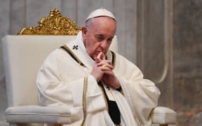 Pope Francis gathers his thoughts during Easter Sunday Mass on April 12, 2020 behind closed doors at St. Peter's Basilica in The Vatican.