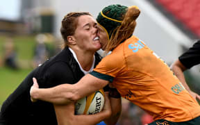 Kaipo Olsen-Baker of the Black Ferns clashes heads with Emily Chancellor of the Wallaroos during the Pacific Four Test Series match between the Wallaroos and the Black Ferns at McDonald Jones Stadium in Newcastle, Saturday, May 10, 2025.