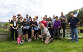 Gerry Forde, founder of the Spirit Army in Invercargill, in the centre kneeling.