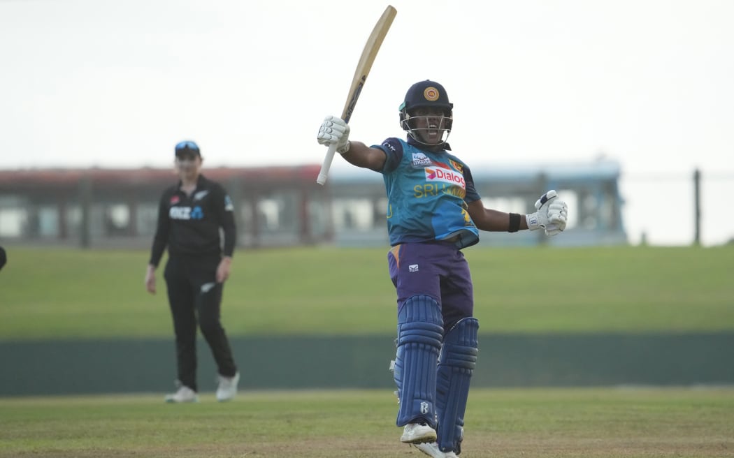 Chamari Athapaththu celebrates her century against New Zealand, 2023.