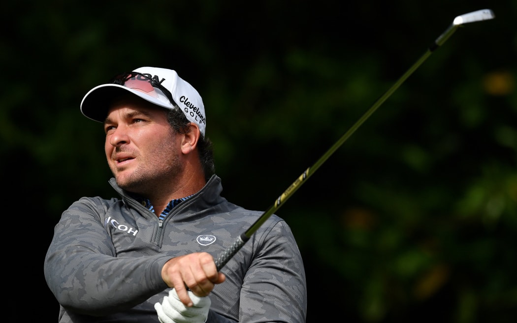 New Zealand's Ryan Fox watches his drive from the second tee on Day 3 of the PGA Championship at Wentworth Golf Club in Surrey, south west of London on October 10, 2020.
