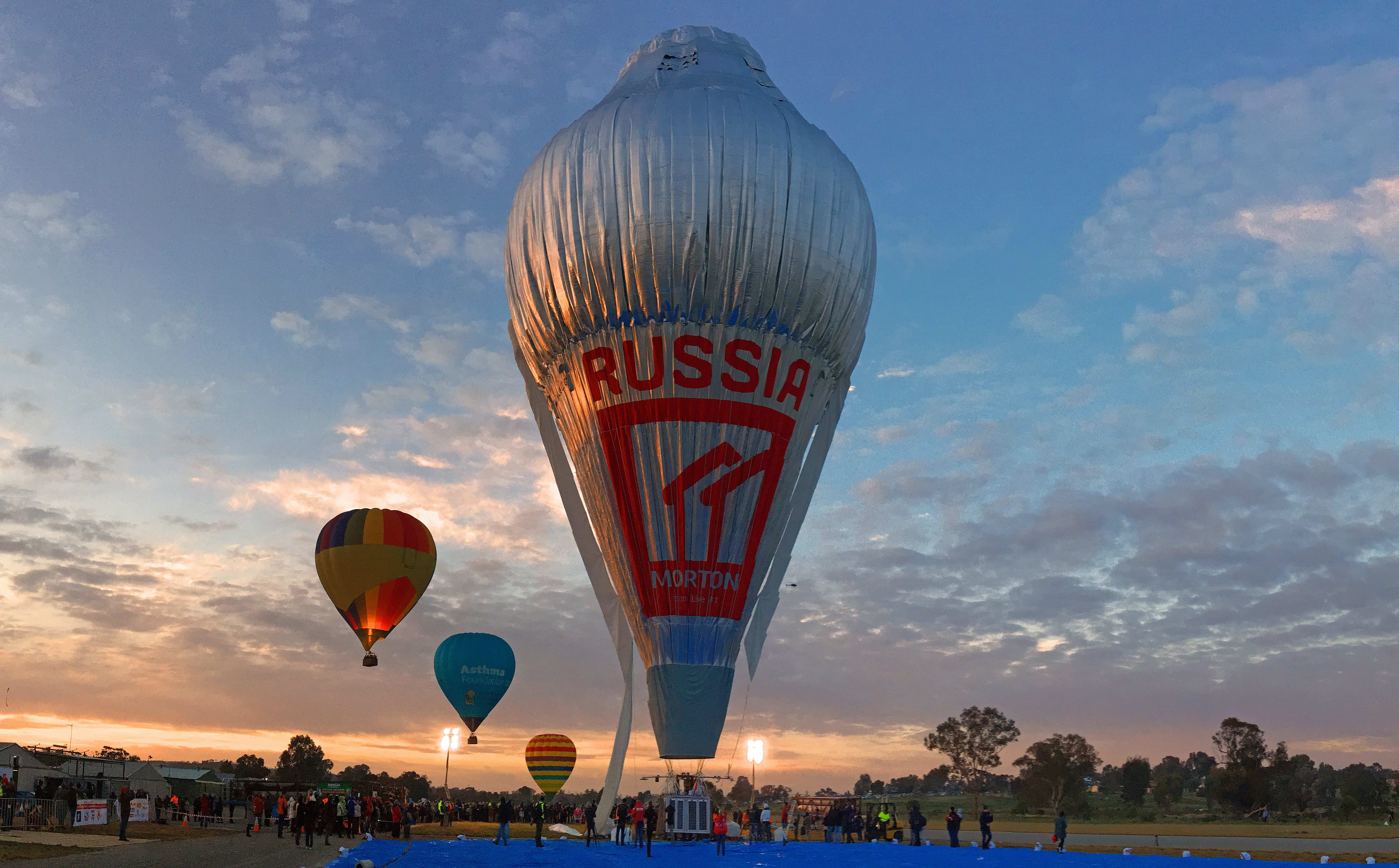 The hot air balloon Morton is seen in this photo about to take to the skies for a round-the-world trip from Northam in Western Australia.