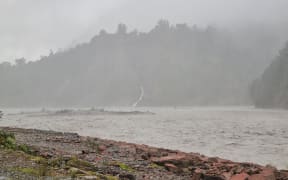 Mist and clouds hover over the area on the road to Franz Josef glacier as the region prepares for heavy rain on 19 January, 2024.