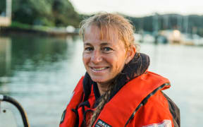 Dr Ingrid Visser aboard her boat in Mill Bay, Mangonui Harbour, Northland