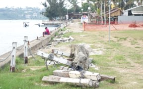 A year on from cyclone Pam, there is still visible signs of damage in the capital, Port Vila. This is along the town's serene waterfront.