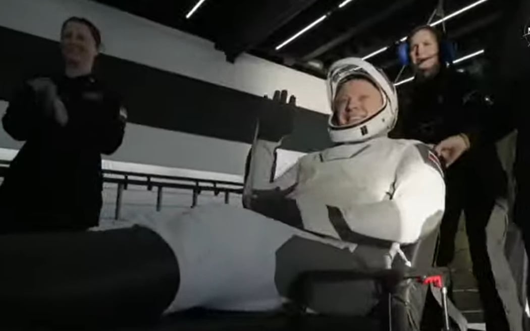 NASA cosmonaut Aleksandr Gorbunov is wheeled out of the SpaceX pod and onto the recovery vessel