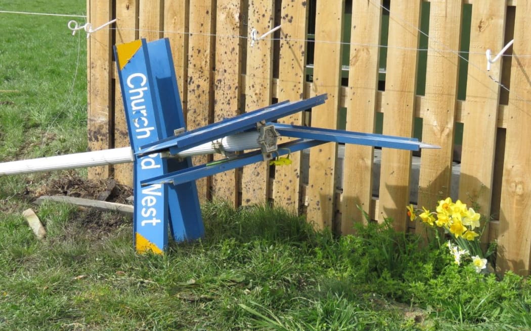 A sign was knocked down in the crash. HAMISH MCNEILLY / THE PRESS