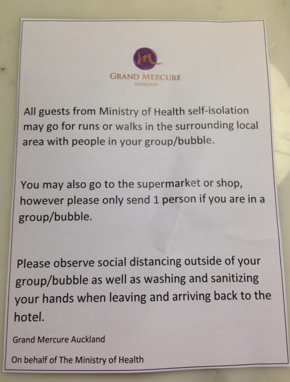 A note from the Grand Mercure hotel in Auckland, on behalf of the Ministry of Health, telling those quarantined in the hotel they can go for walks etc outside.