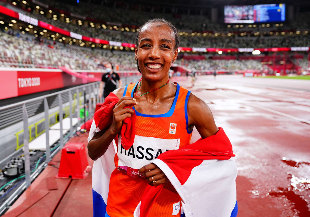 Netherlands' Sifan Hassan celebrates winning the women's 5000m final during the Tokyo 2020 Olympic Games at the Olympic Stadium in Tokyo on August 2, 2021.