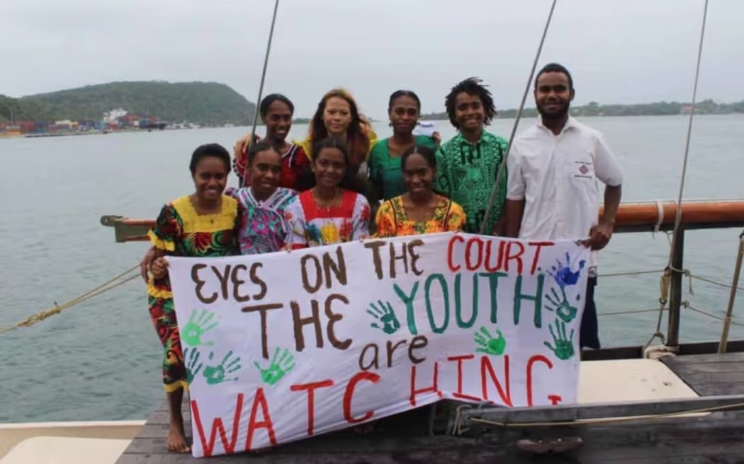 Save the Children Vanuatu NextGen Youth Ambassadors and youth climate activists demonstrating ahead of the historic International Court of Justice Advisory Opinion on Obligations of States in respect of Climate Change.