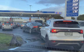 Large queues formed outside the Manukau Mobil this evening.