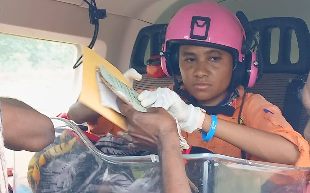 The newborn boys until a medivac to Lae.