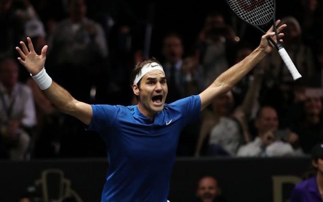 Roger Federer celebrates