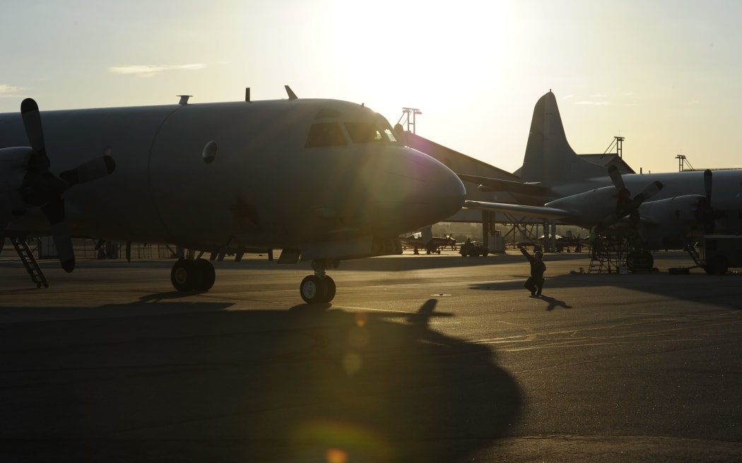 An Australian Orion aircraft arrives back at Pearce Airbase, near Perth, after searching for missing Malaysia Airlines Flight MH370