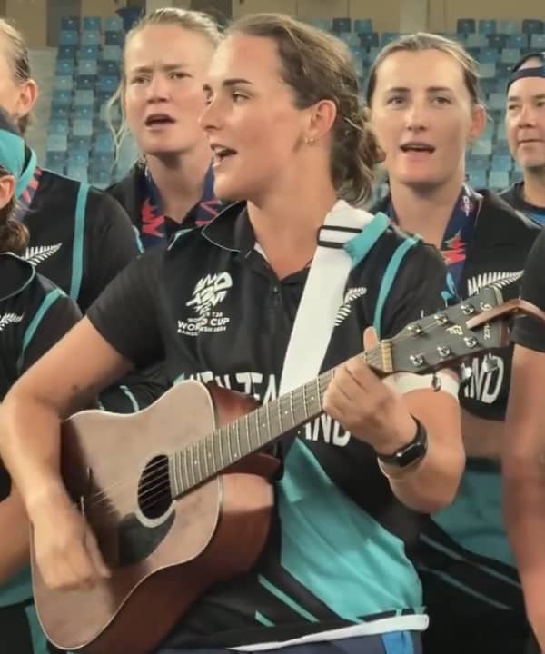 Amelia Kerr leads the White Ferns in song after history-making T20 World Cup win.
