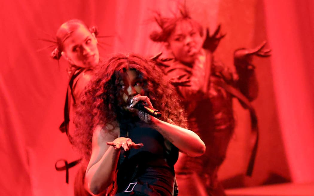 LOS ANGELES, CALIFORNIA - FEBRUARY 04: (FOR EDITORIAL USE ONLY) SZA performs onstage during the 66th GRAMMY Awards at Crypto.com Arena on February 04, 2024 in Los Angeles, California.   Amy Sussman/Getty Images/AFP (Photo by Amy Sussman / GETTY IMAGES NORTH AMERICA / Getty Images via AFP)