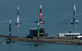 The SailGP F50 catamaran fleet moored around the Main Stage and Platinum Lawn on Race Day 1 of the ITM New Zealand Sail Grand Prix in Christchurch, New Zealand. Saturday 23rd March 2024. Photo: Felix Diemer for SailGP. Handout image supplied by SailGP
