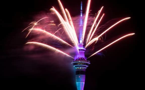 The Sky Tower lit up with an impressive fireworks display.