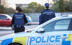 Police at the scene of an unexplained death in Riccarton, Christchurch on 19 June.