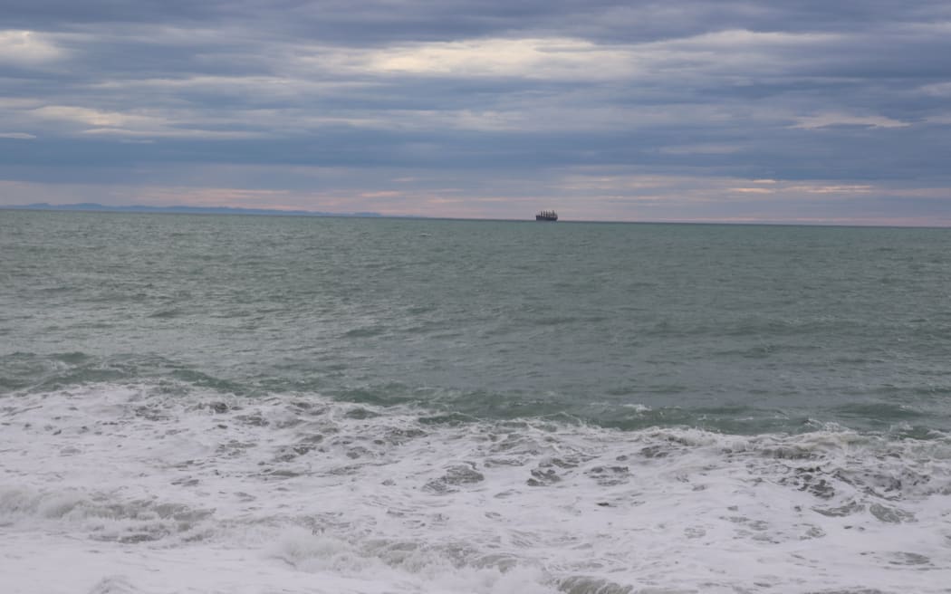 A logging ship, Ken Rei, anchored in Napier on Monday morning, awaiting official advice after a Covid-19 scare.