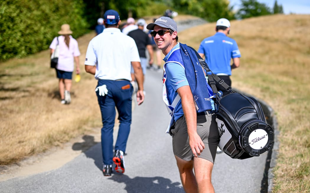 New Zealand's Denzel Iremia with caddie Elliott Jenkins during the final round of the 104th NZ Open golf tournament at Millbrook Resort, Arrowtown.
