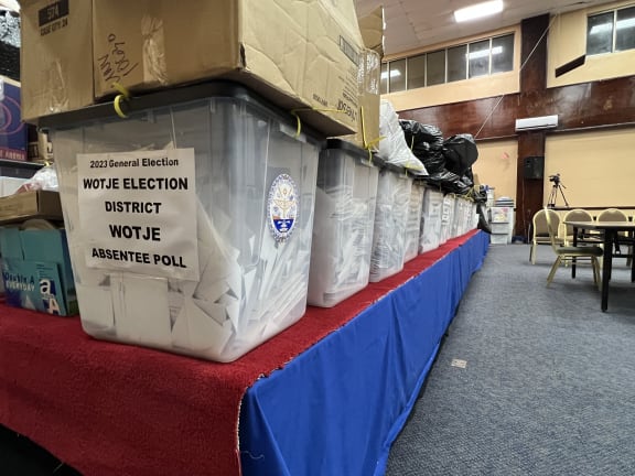 After the closing of polling stations during the 20 November election, the ballot boxes were brought into the tabulation headquarters and lined up to await counting. Photo: Giff Johnson.