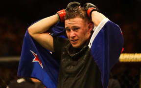 Kai Kara France after defeating Raulian Paiva at UFC 234 at Rod Laver Arena Melbourne in 2019.