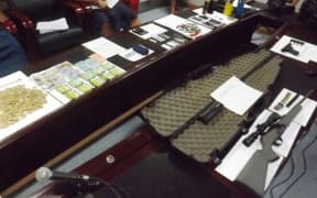 Samoa police raid uncovers weapons, drugs and cash.