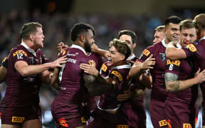 Hamiso Tabuai-Fidow celebrates his opening try during State of Origin 1.