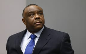 Former Congolese vice-president Jean-Pierre Bemba sits in the courtroom of the International Criminal Court in The Hague.