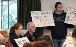 Dozens of staff and students crammed into a Massey Council meeting this week to protest proposed cuts.