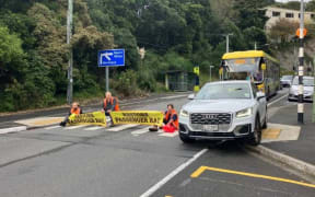 Protesters on Glenmore St at the city end of the Karori tunnel. Wellington, 3 May 2023