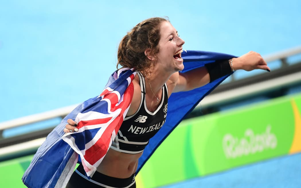 Pole vaulter Eliza McCartney celebrates after winning bronze at the Rio 2016 Olympics.